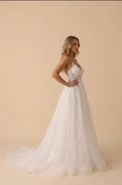 Elegant Floral Lace A-Line Wedding Dress with Spaghetti Straps and Sweep Train