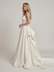 Elegant Spaghetti Strap Satin A-Line Wedding Dress with Draped Overskirt and Chapel Train