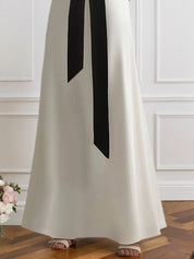 Formal Black and White Halter Cross-Neck Maxi Dress
