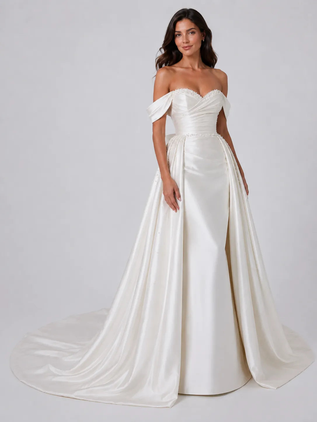 Elegant Off-Shoulder Satin Wedding Dress with Ruched Sweetheart Bodice, Overskirt, Beading and Chapel Train