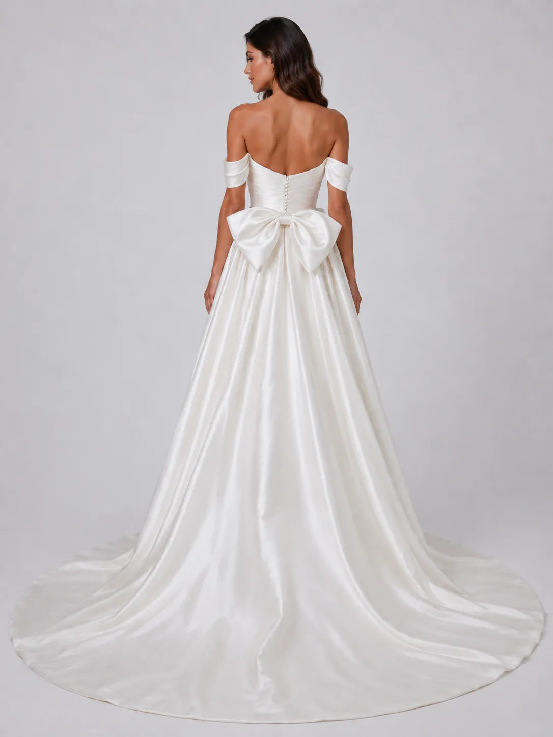 Elegant Off-Shoulder Satin Wedding Dress with Ruched Sweetheart Bodice, Overskirt, Beading and Chapel Train
