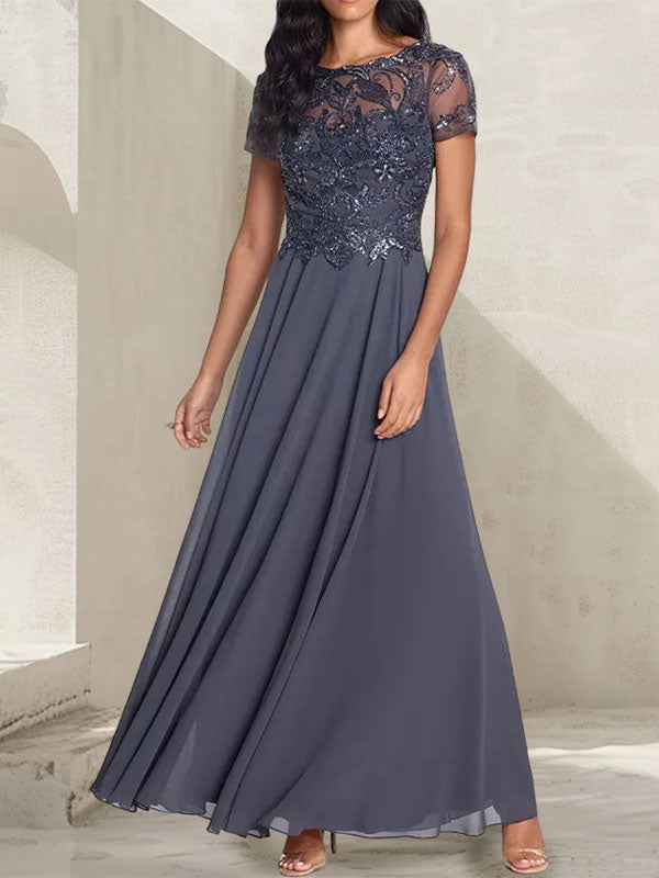 Robe longue de mère de la mariée gris anthracite, coupe trapèze et décolletée, avec perles