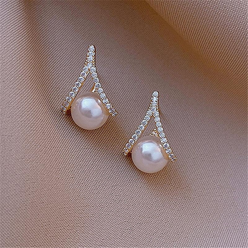 1_Pair_Women_s_Romantic_Pearl_Stud_Classic_Shining_Earrings_0a5a99fc-790d-46fc-b6e1-ad178c3332c7.jpg