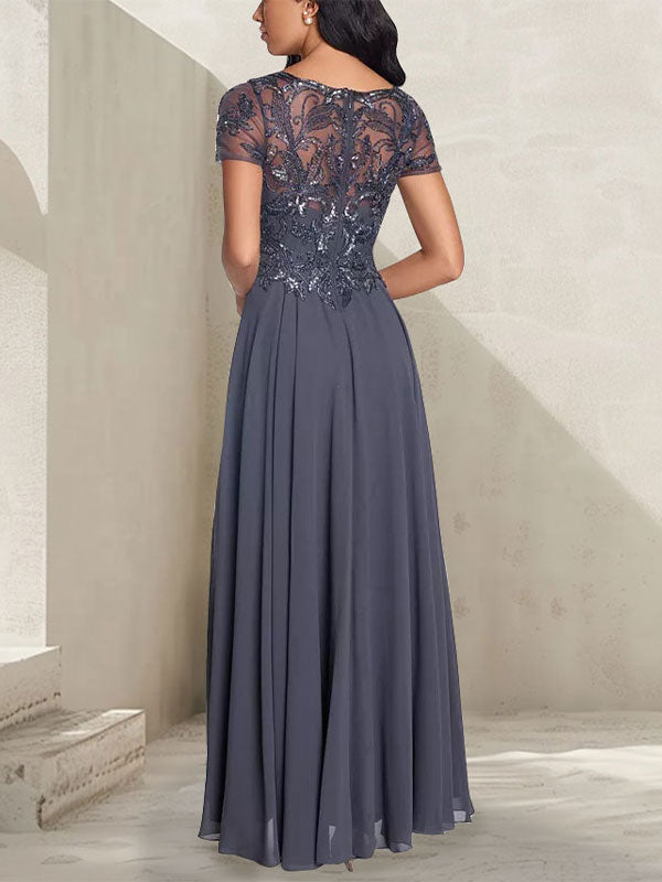 Robe longue de mère de la mariée gris anthracite, coupe trapèze et décolletée, avec perles