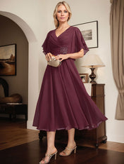 A-line V-Neck Tea-Length Chiffon Mother of the Bride Dress With Pleated Beading