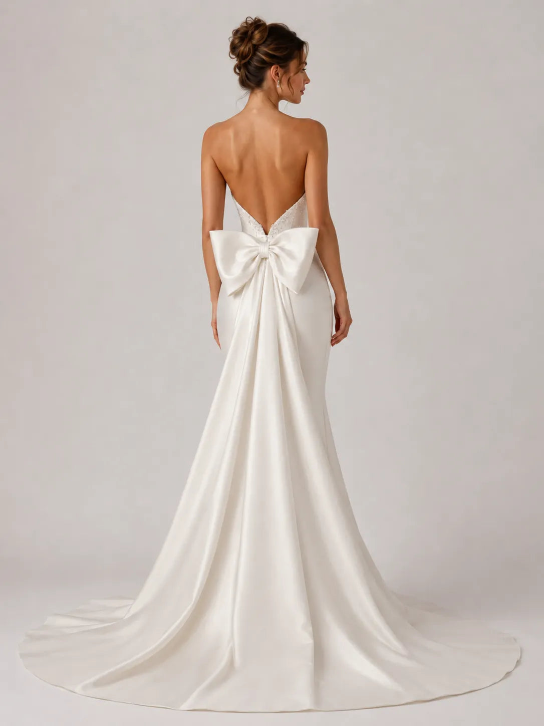 Elegant Strapless Satin Mermaid Wedding Dress with Beaded Neckline and Back Bow