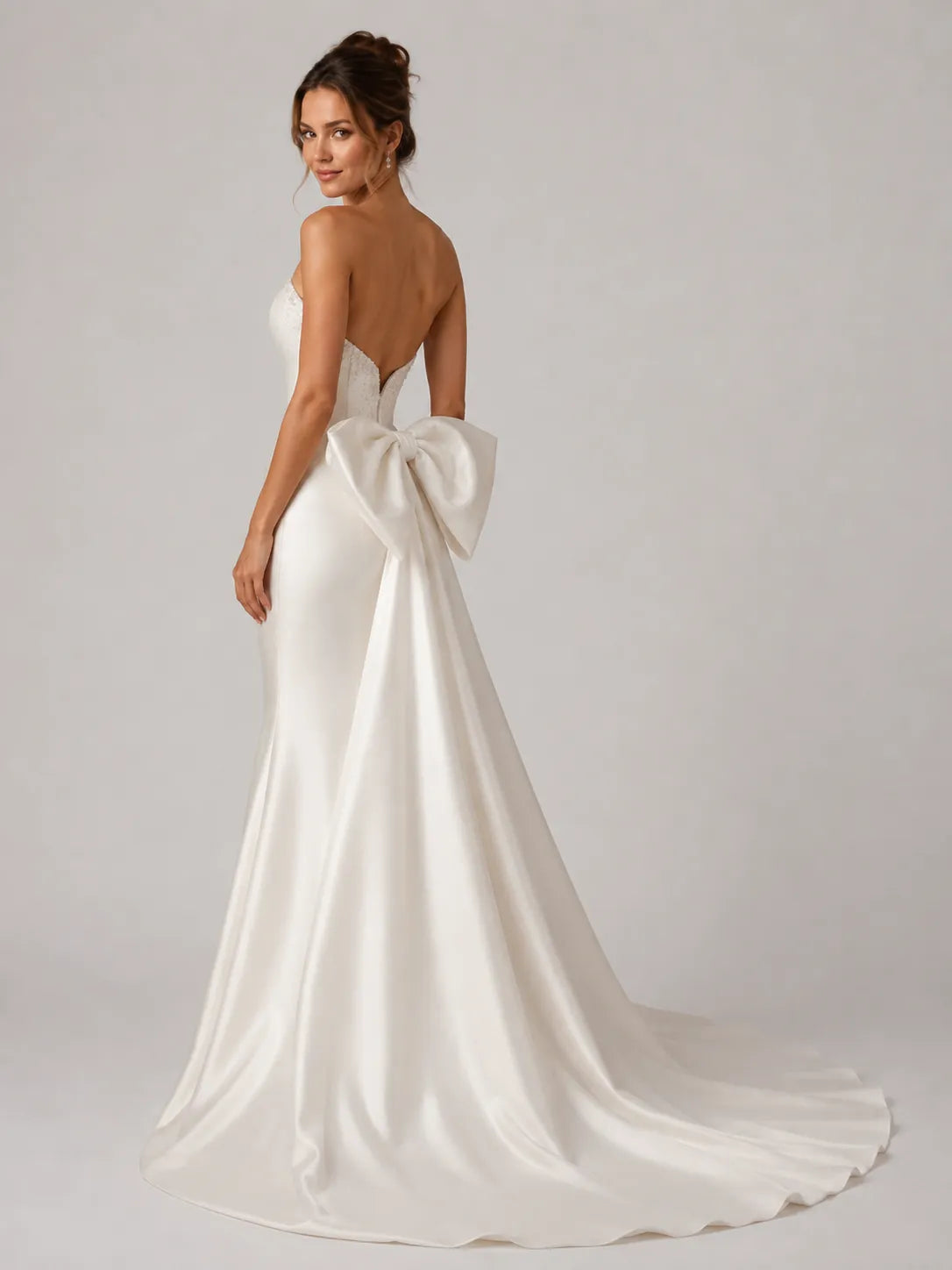 Elegant Strapless Satin Mermaid Wedding Dress with Beaded Neckline and Back Bow
