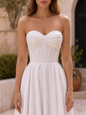 Elegant Strapless A-Line Wedding Dress with Draped Bow Bodice & High Slit