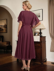 A-line V-Neck Tea-Length Chiffon Mother of the Bride Dress With Pleated Beading