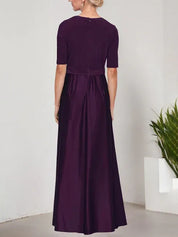 Robe de bal à décolleté surplis avec jupe ample en satin et corsage en jersey 