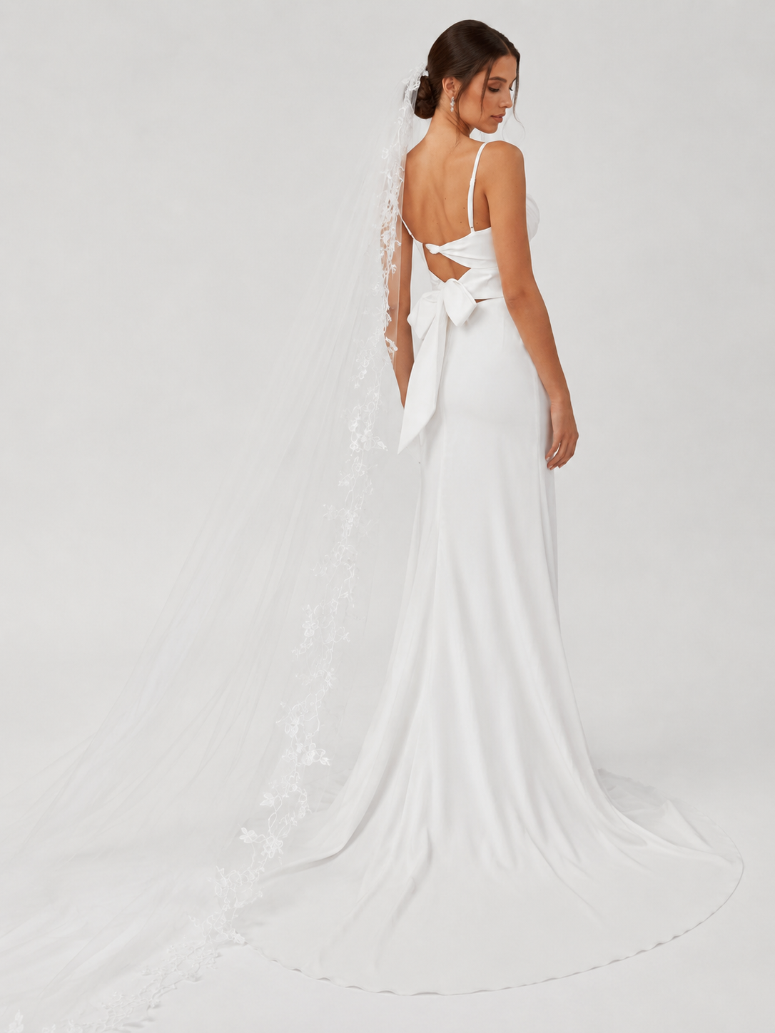 Elegant Cowl Neck Satin Sheath Wedding Dress with Bow Back, High Slit, and Sweep Train