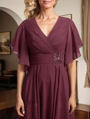 A-line V-Neck Tea-Length Chiffon Mother of the Bride Dress With Pleated Beading