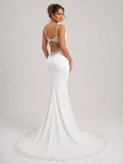 Elegant Spaghetti Strap Mermaid Wedding Dress with Lace Cutouts and Open Back