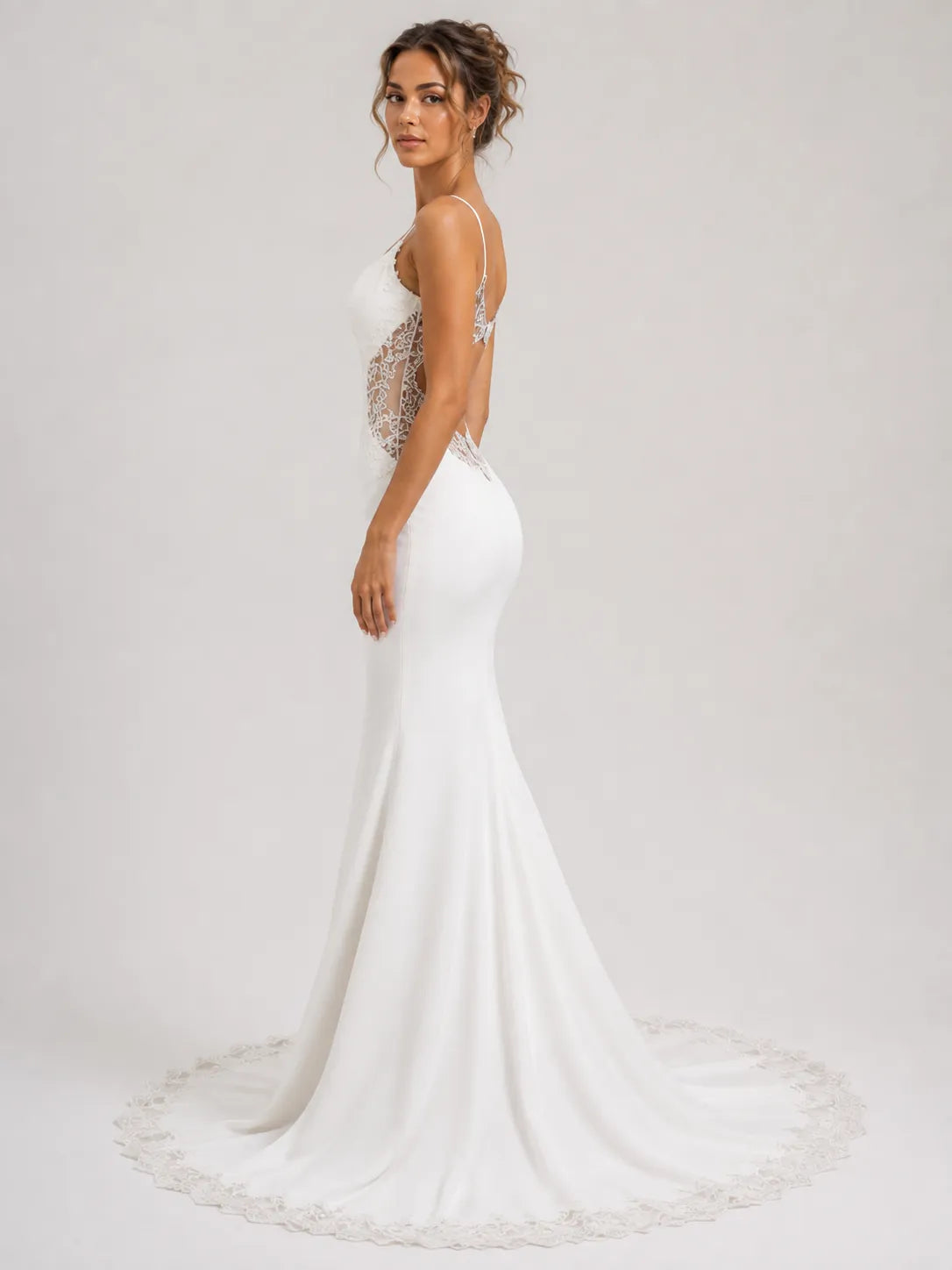 Elegant Spaghetti Strap Mermaid Wedding Dress with Lace Cutouts and Open Back