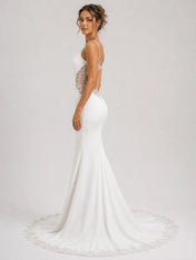 Elegant Spaghetti Strap Mermaid Wedding Dress with Lace Cutouts and Open Back