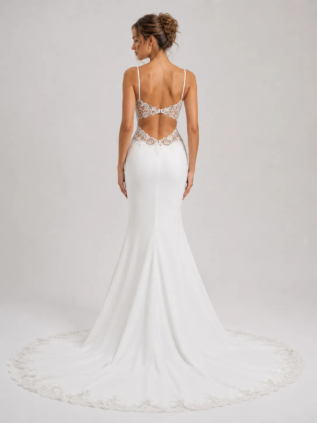 Elegant Spaghetti Strap Mermaid Wedding Dress with Lace Cutouts and Open Back