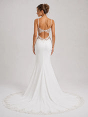 Elegant Spaghetti Strap Mermaid Wedding Dress with Lace Cutouts and Open Back
