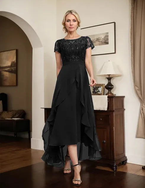 Robe de mère de la mariée asymétrique en mousseline de soie et dentelle, coupe trapèze, décolleté en V, avec nœud, volants et paillettes 