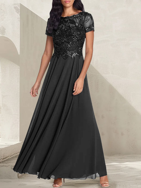 Robe longue de mère de la mariée gris anthracite, coupe trapèze et décolletée, avec perles