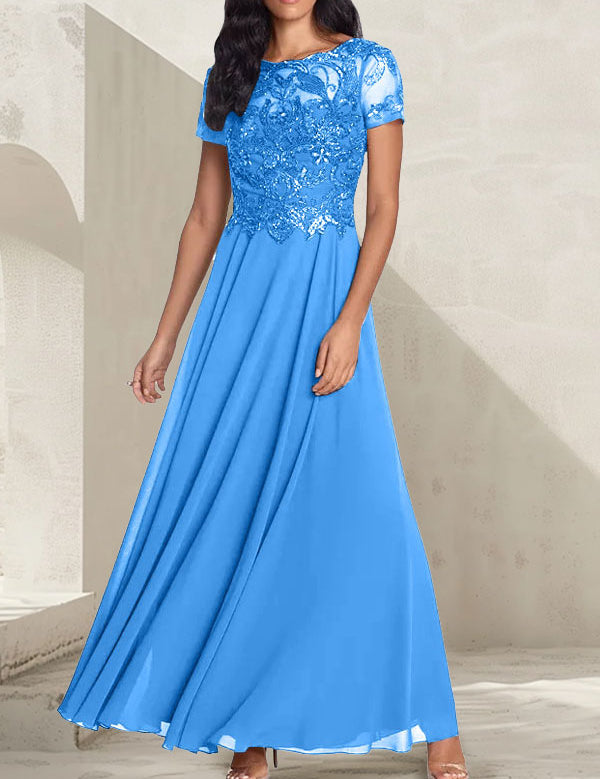 Robe longue de mère de la mariée gris anthracite, coupe trapèze et décolletée, avec perles