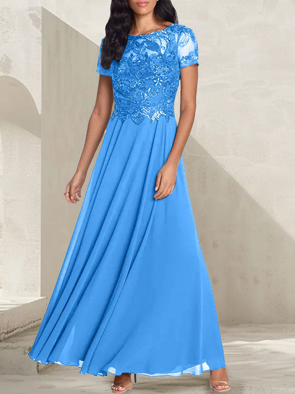 Robe longue de mère de la mariée gris anthracite, coupe trapèze et décolletée, avec perles