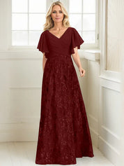 Robe de mère de la mariée trapèze, col en V, longueur au sol, en mousseline de soie et dentelle à sequins, avec plis 