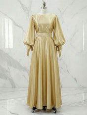 Champagne Long Sleeve Ruched Waist Flowing Evening Gown