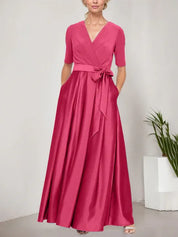 Robe de bal à décolleté surplis avec jupe ample en satin et corsage en jersey 