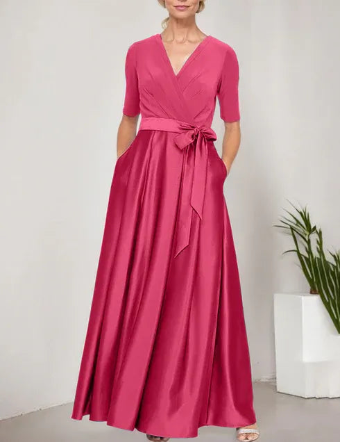 Robe de bal à décolleté surplis avec jupe ample en satin et corsage en jersey 