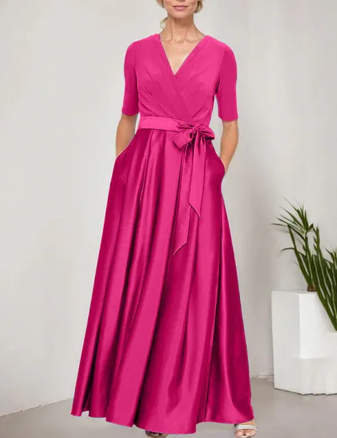 Robe de bal à décolleté surplis avec jupe ample en satin et corsage en jersey 