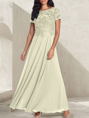 Robe longue de mère de la mariée gris anthracite, coupe trapèze et décolletée, avec perles