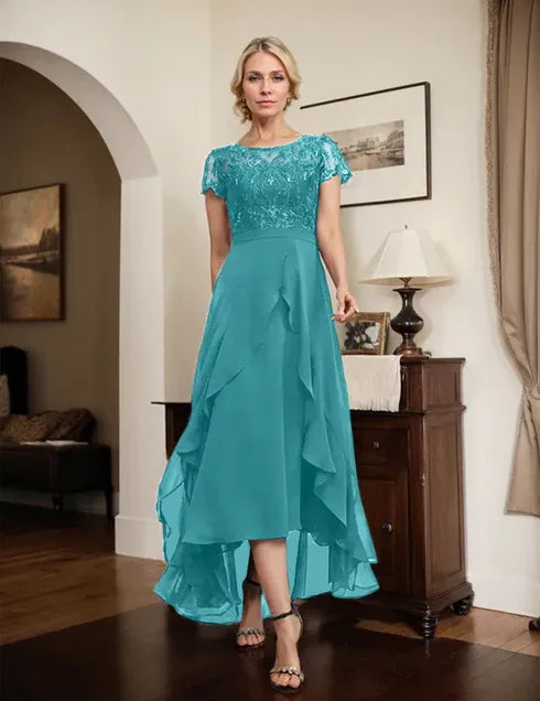 Robe de mère de la mariée asymétrique en mousseline de soie et dentelle, coupe trapèze, décolleté en V, avec nœud, volants et paillettes 