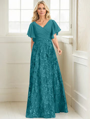 Robe de mère de la mariée trapèze, col en V, longueur au sol, en mousseline de soie et dentelle à sequins, avec plis 