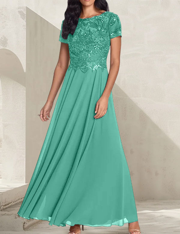 Robe longue de mère de la mariée gris anthracite, coupe trapèze et décolletée, avec perles