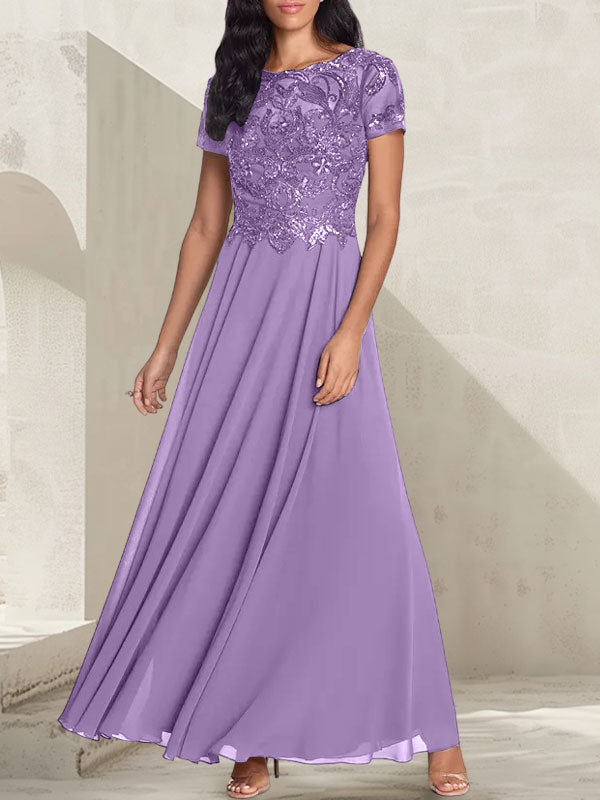 Robe longue de mère de la mariée gris anthracite, coupe trapèze et décolletée, avec perles