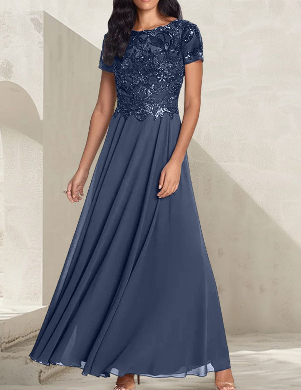 Robe longue de mère de la mariée gris anthracite, coupe trapèze et décolletée, avec perles