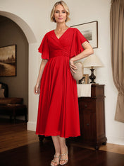 A-line V-Neck Tea-Length Chiffon Mother of the Bride Dress With Pleated Beading