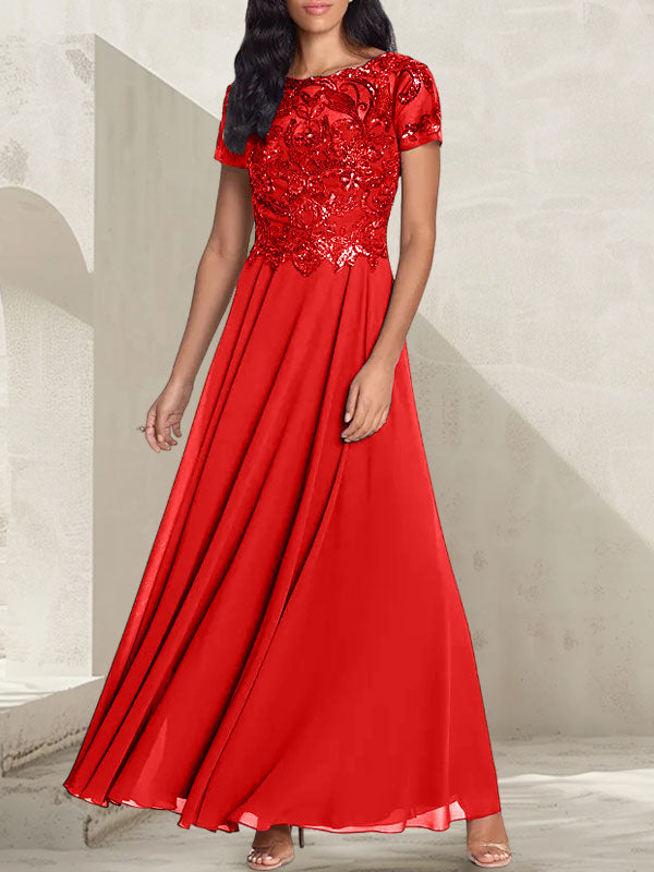 Robe longue de mère de la mariée gris anthracite, coupe trapèze et décolletée, avec perles