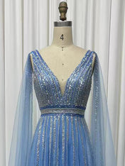 Regal Beaded Bodice Gown with Floor-Length Capes