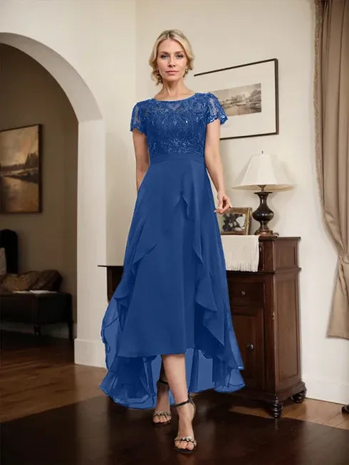 Robe de mère de la mariée asymétrique en mousseline de soie et dentelle, coupe trapèze, décolleté en V, avec nœud, volants et paillettes 