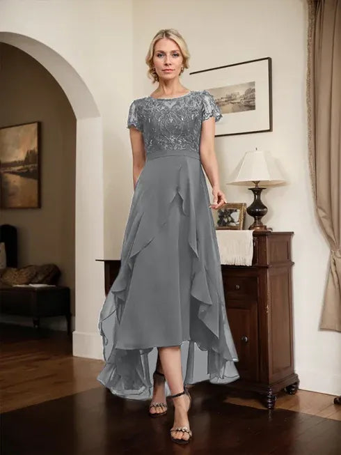 Robe de mère de la mariée asymétrique en mousseline de soie et dentelle, coupe trapèze, décolleté en V, avec nœud, volants et paillettes 