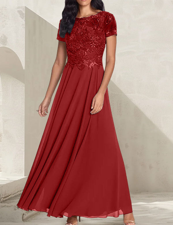 Robe longue de mère de la mariée gris anthracite, coupe trapèze et décolletée, avec perles