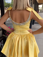 Yellow A-Line Bateau Bow Straps Satin Beaded Homecoming Dress