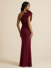 Burgundy One-Shoulder Sheath Evening Gown with Oversized Floral Feather Shoulder Detail & High Slit