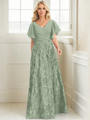 Robe de mère de la mariée trapèze, col en V, longueur au sol, en mousseline de soie et dentelle à sequins, avec plis 